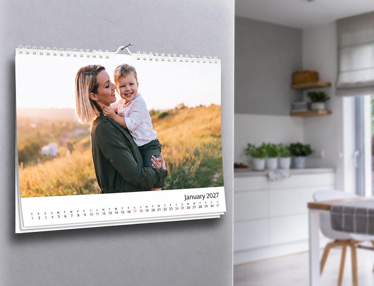 Custom A3 landscape gallery photo wall calendar, spiral-bound, hanging on a wall