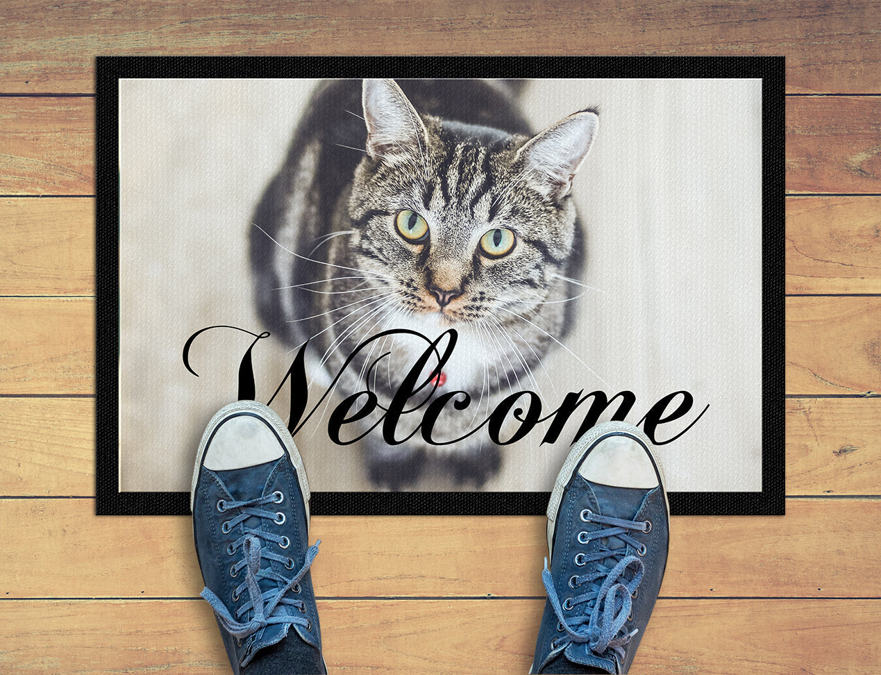 Custom door mats. This is used as a Welcome mat showing a cat image.