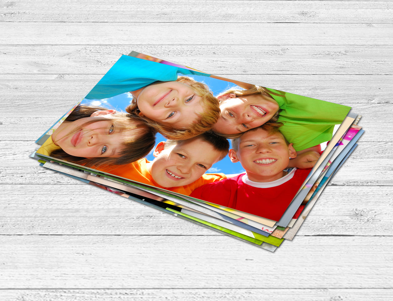 Stack of standard size Photo Prints Online from different pictures