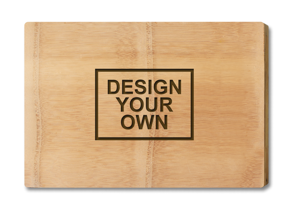A natural bamboo chopping board with 'DESIGN YOUR OWN' text engraved on it