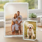 Two acrylic photo blocks displaying family and pet images on a desk.