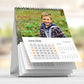 Custom 15 × 20 cm vertical photo desk calendar with photos, flip-style -  spiral-bound, standing on an office desk