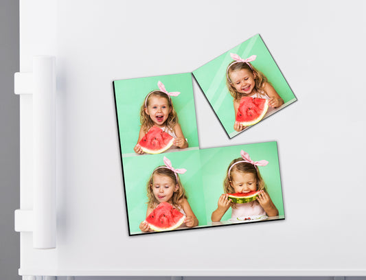 Four square tiles magnet - personalised with a child eating watermelon - stuck on a fridge