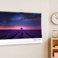 A3 landscape wall calendar with white wire binding, angled view, ideal for showcasing artwork.