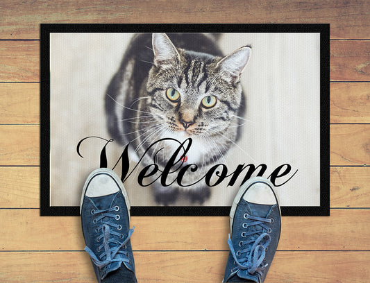 Custom door mats. This is used as a Welcome mat showing a cat image.