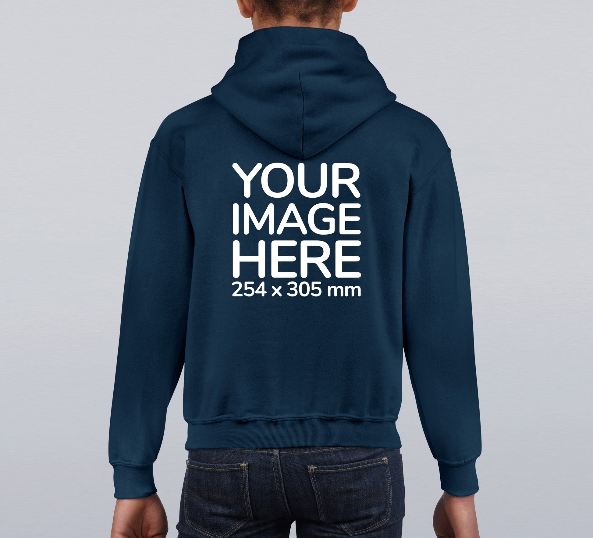 Kid wearing a Navy Blue Hoodie, displaying the back, showing a placeholder image indicating that the Custom Hoodie can be customised with own design and image on back side.